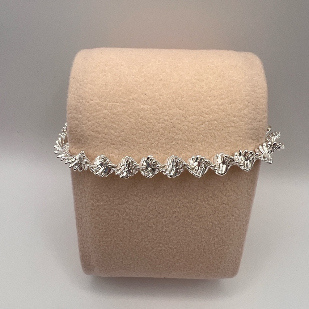 Napier silver tone twisted bracelet